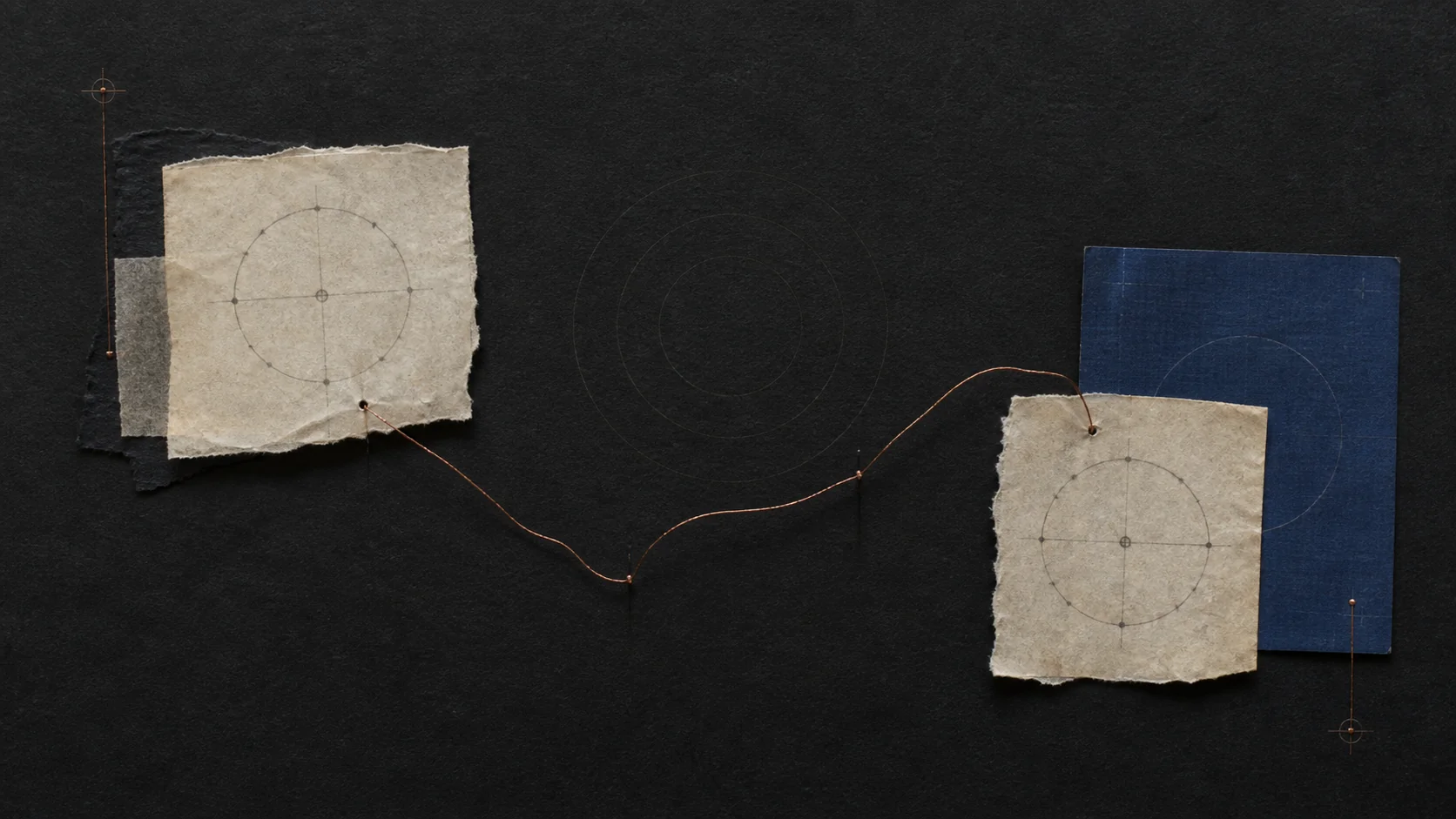 Two archival diagrams connected by a copper thread